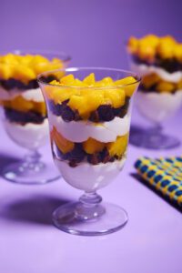 Parfait cups layered with Bake Believe, Mango, and cheesecake filling