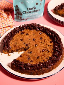 Pumpkin giant cookie frosted with Bake Believe