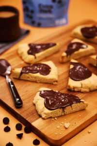 Gingerbread scones covered with Bake Believe Chocolate Flavored spread